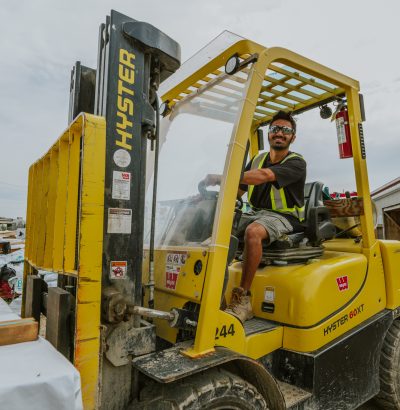 Employee on forklift