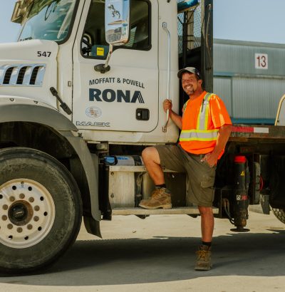 Driver beside truck