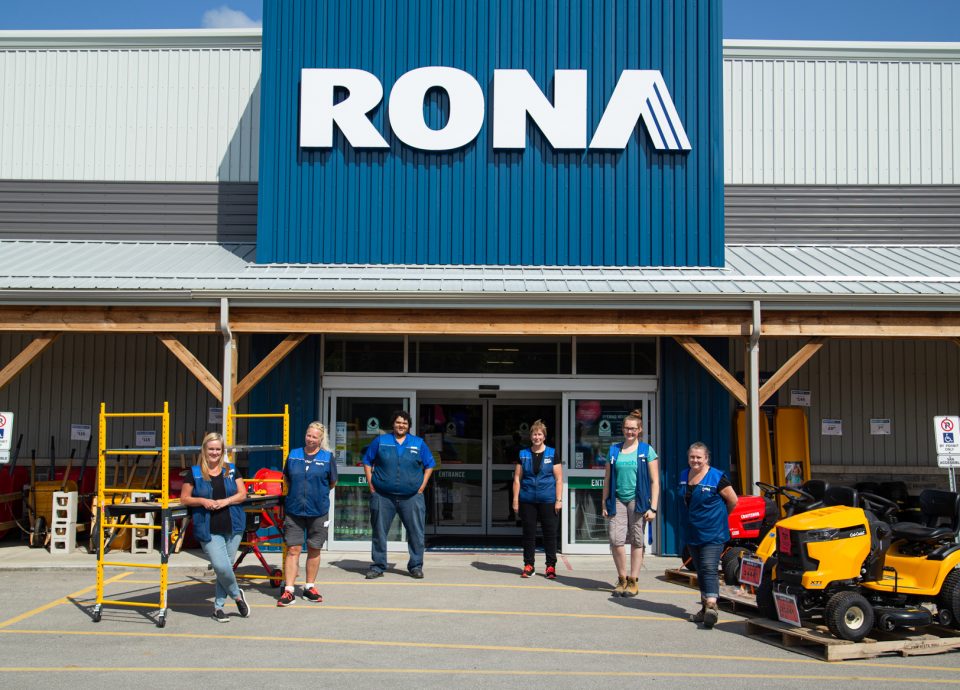 Group of employees outside of store